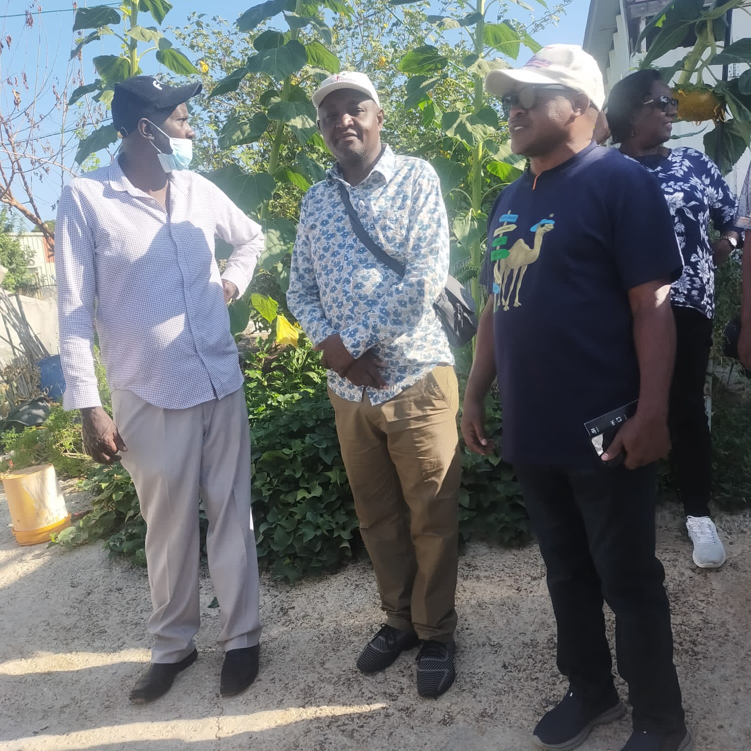 Moses Gitau and Msme customers during a visit to a farmer in Israel tour
